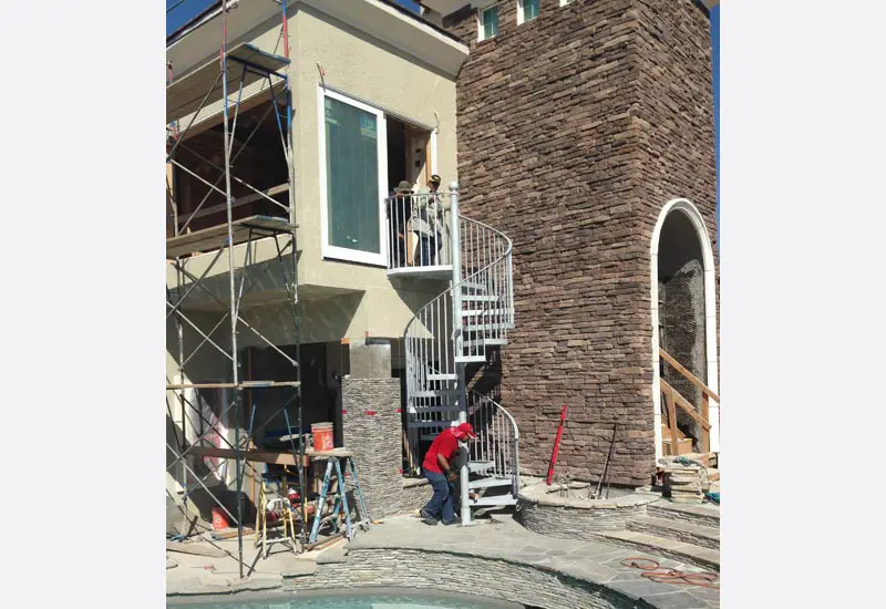 Wrought Iron Spiral Staircase in Villa Park Home Remodel